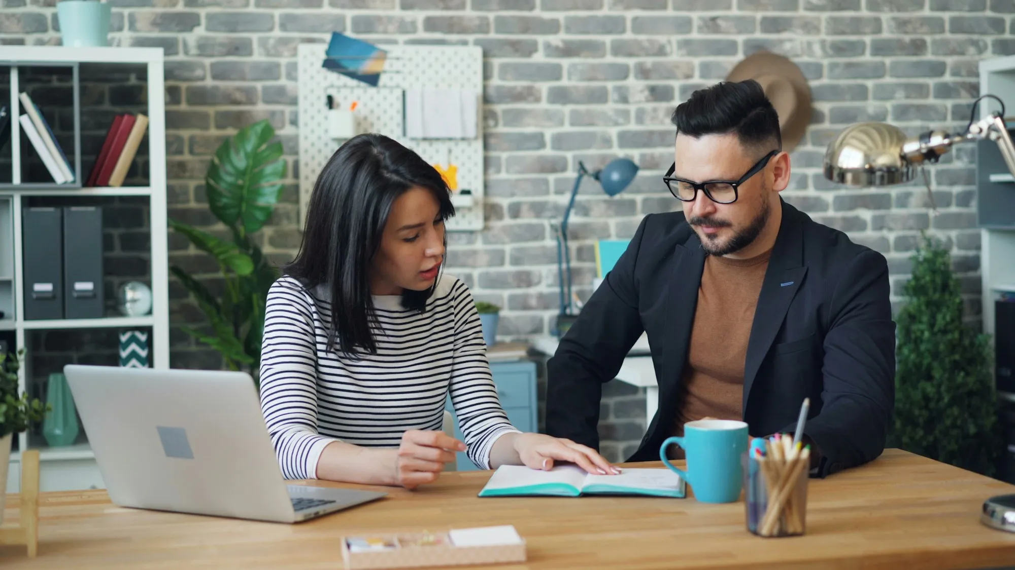 Couple working out their numbers at home