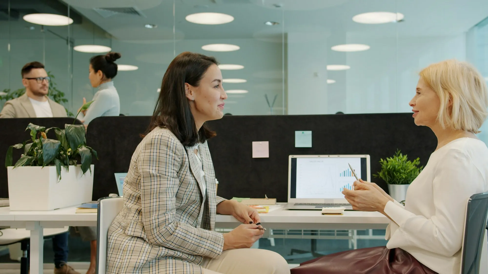 Couple reviewing their amortization with an advisor