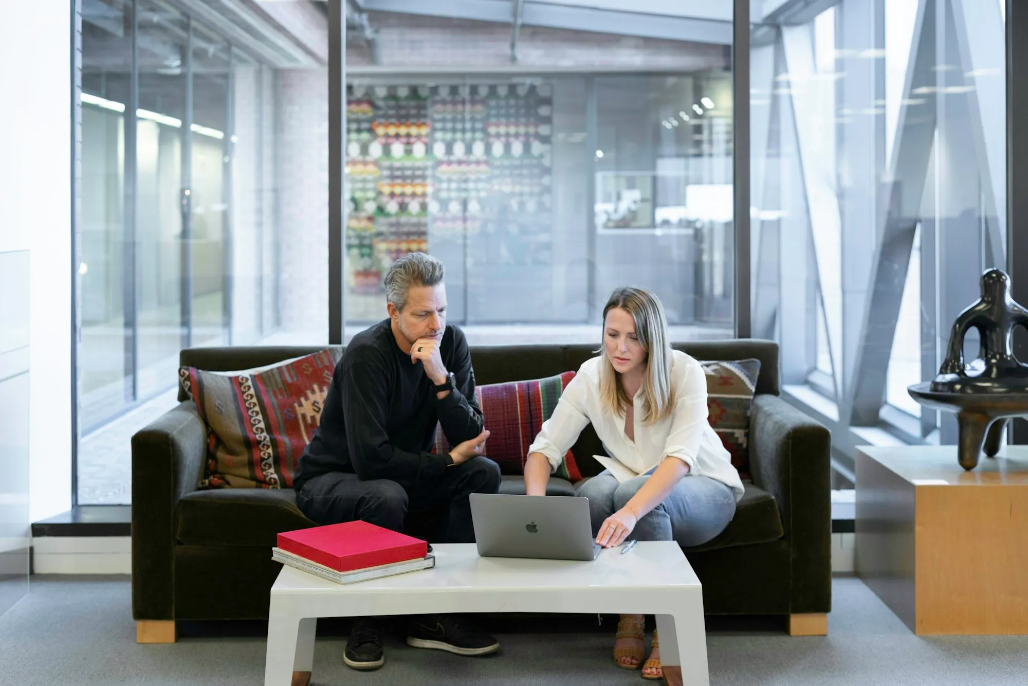 Couple planning their mortgage at the kitchen table