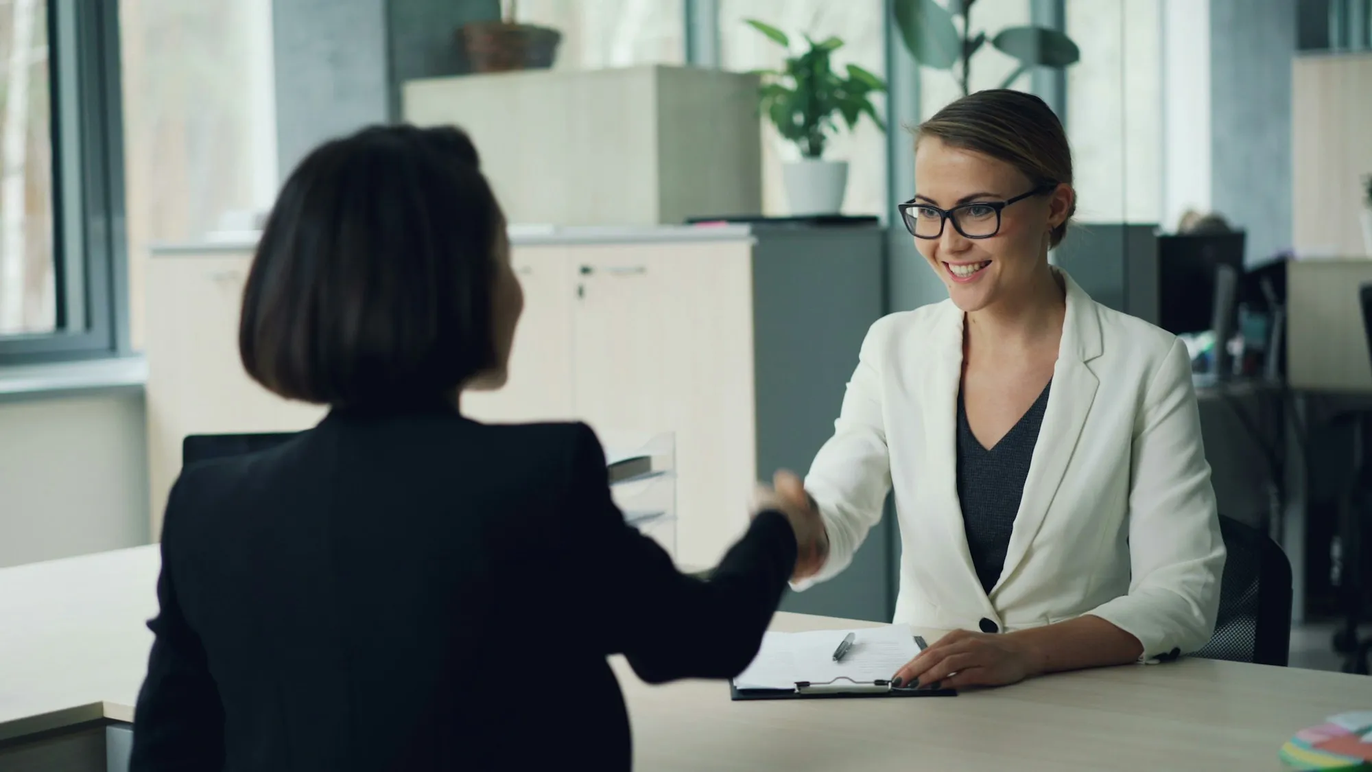 Couple getting pre-approved with a broker