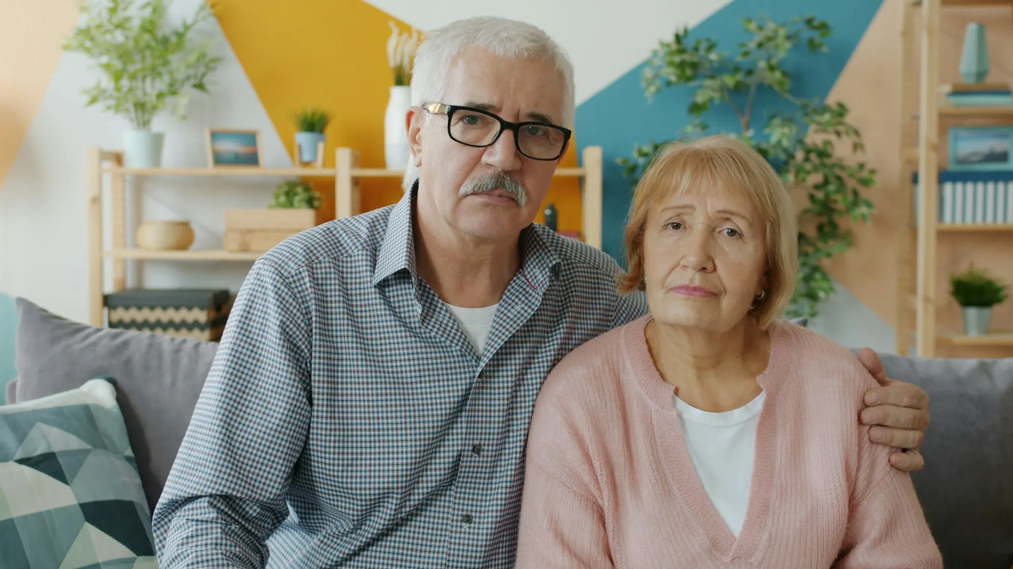 Couple weighing renting versus buying