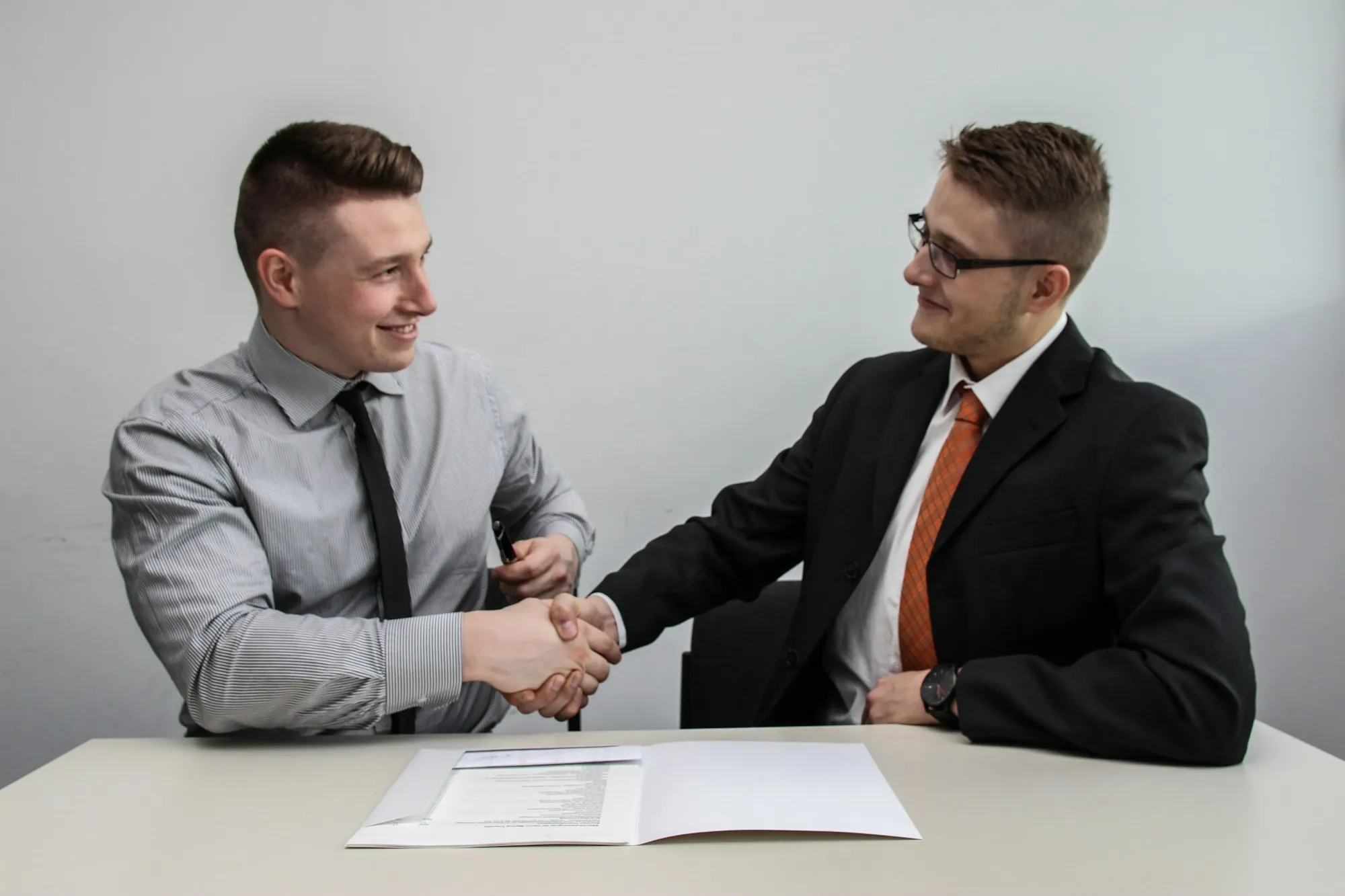 Closing the sale with a handshake
