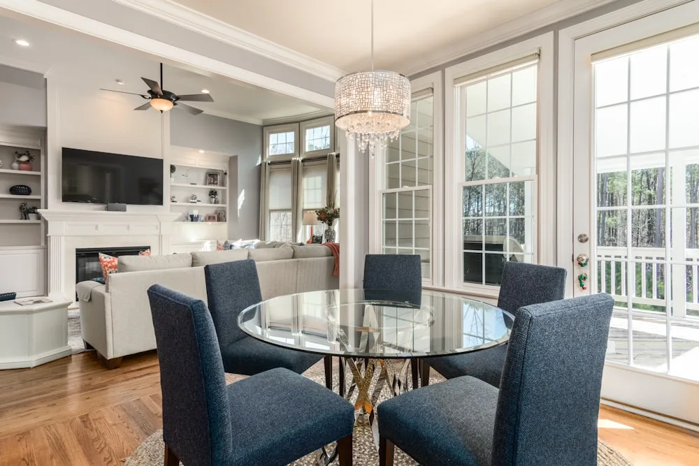 Bright open-concept living and dining room of a first home bought with HOMEH