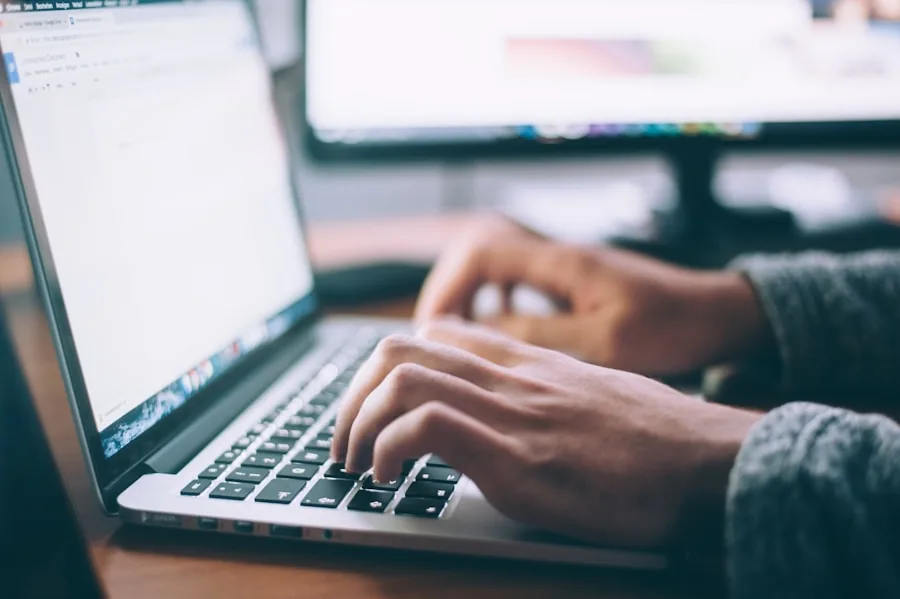 Tenant browsing Ontario rental listings on a laptop
